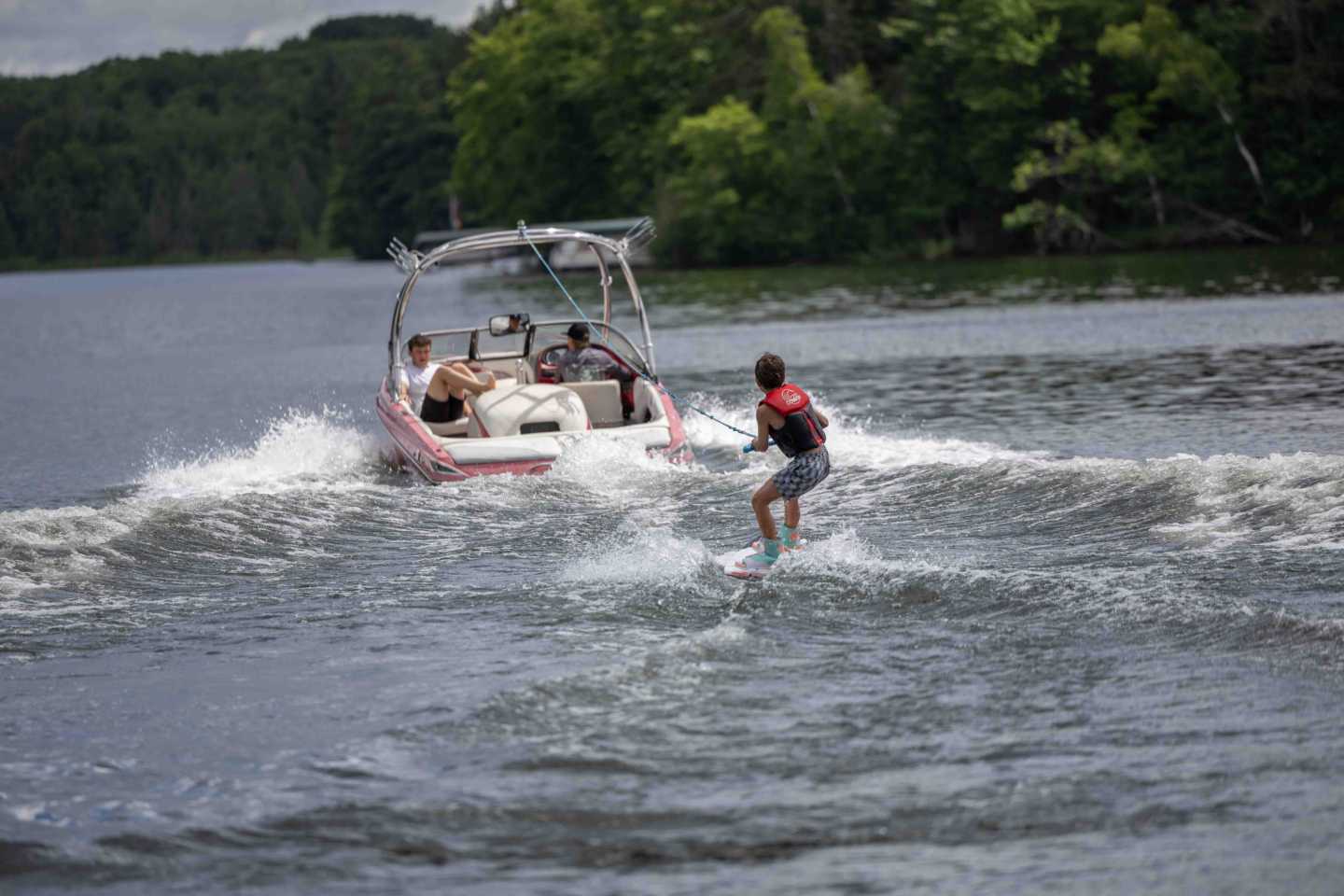 A camper out on the water during a waterfront activity at North Star Camp for Boys