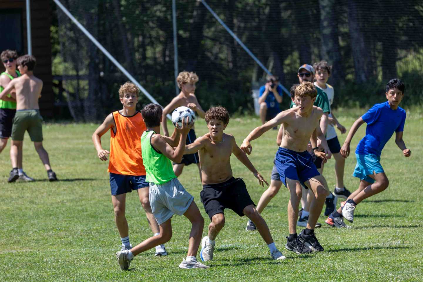 Campers and staff play a spirited team game on United Nations Day at North Star Camp for Boys