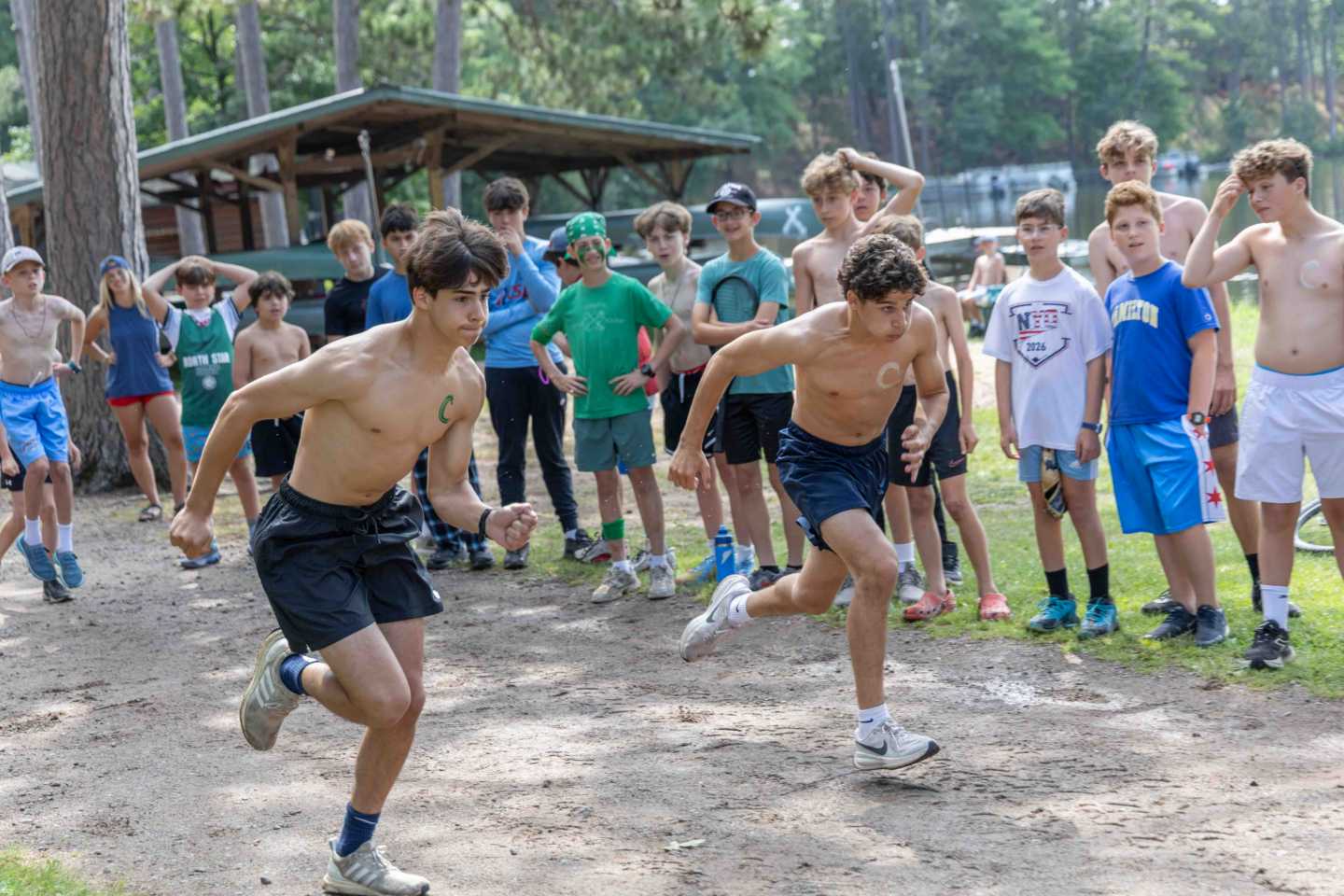 Campers run together during a Fourth of July event at North Star Camp for Boys in Wisconsin