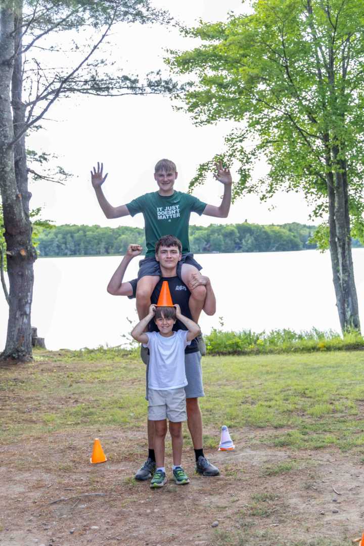 Campers celebrate together during a high-energy evening at camp