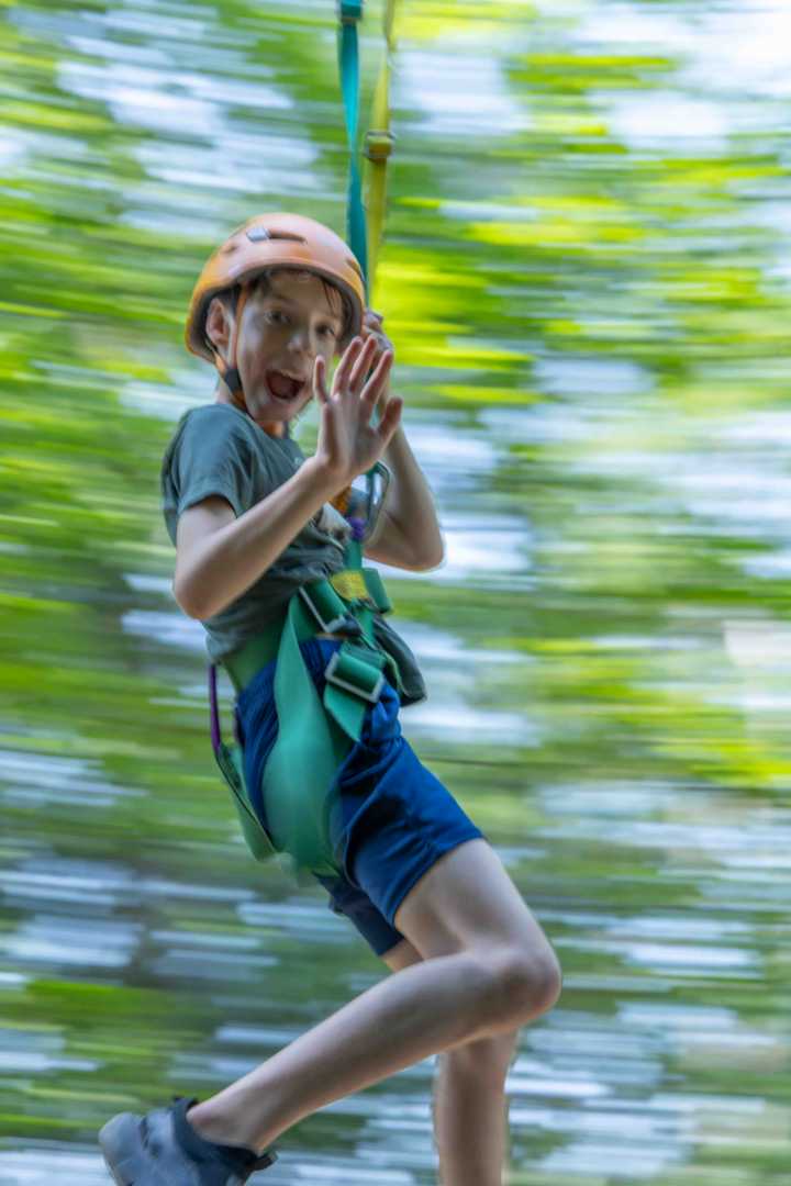 A North Star camper glides toward Clear Lake during a Cruiser Day water activity.