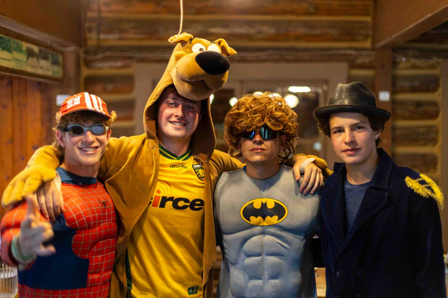 Counselors in costume welcoming campers to the opening banquet dinner